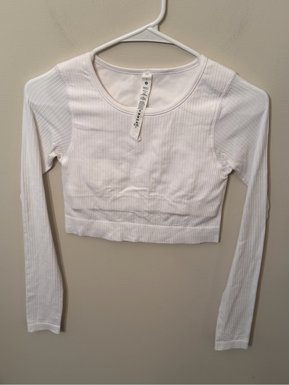 Lululemon Ebb to Street Longsleeve in White w/ removable pads size 4